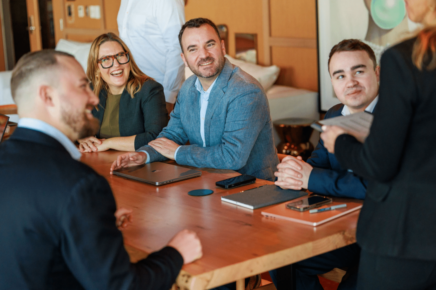 Business brokers from Exit Equity sitting at a table